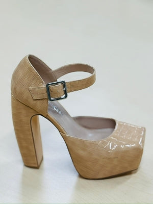 Beige high-heeled pump with chunky platform on a white background